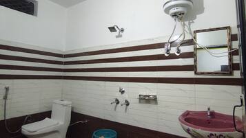 Standard Quadruple Room, Hill View | Bathroom | Shower, towels, soap, shampoo