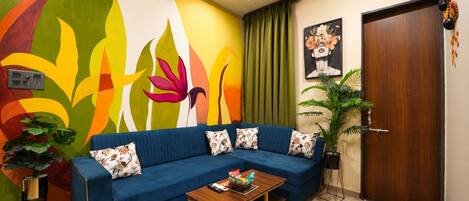 Habitación individual Deluxe | Área de sala de estar