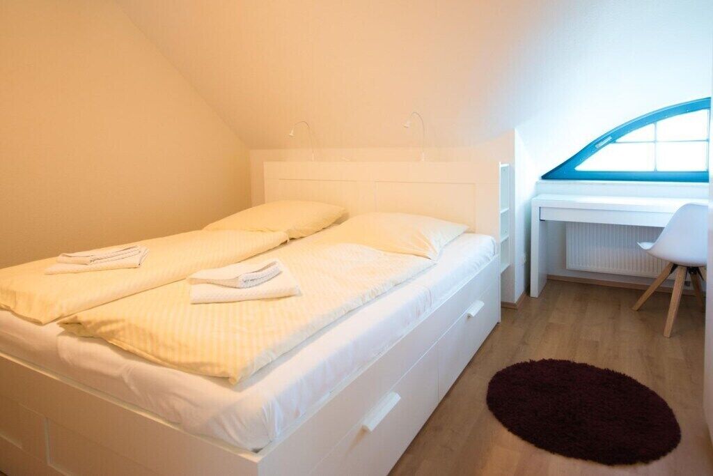 1 bedroom, desk, iron/ironing board, travel cot