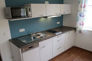 Private kitchen - Kiwi Holiday Apartment 7 (Alt Schwerin\/Ortkrug)