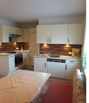 Coffee/tea maker, fridge, oven, stovetop - Apartment in Leogang with swimming pool (Leogang)