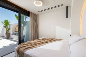 Suite de lujo, vista al mar | Caja de seguridad en la habitación y cortinas blackout 
