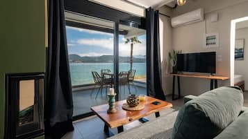 Duplex superluxo, vista para o mar | Área de estar