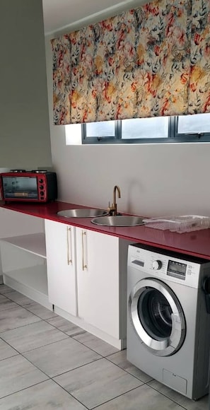Apartment, 1 Bedroom, Accessible, Smoking | Laundry - Villa Du-baai 1 Luxury Apartment (Mossel Bay)