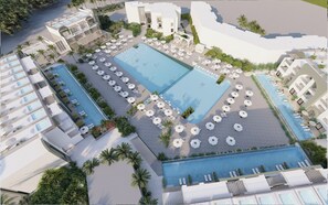 A resort with multiple swimming pools, sun loungers, and palm trees. - SUNRISE Makadi Boutique  Resort (Makadi Bay)
