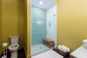 Shower, hair dryer, towels