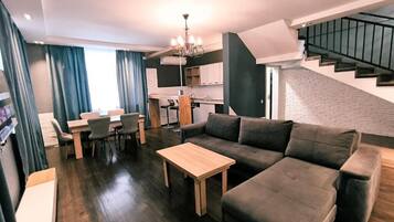 Luxury Studio Suite, Mountain View | Living area | 43-inch LED TV with satellite channels