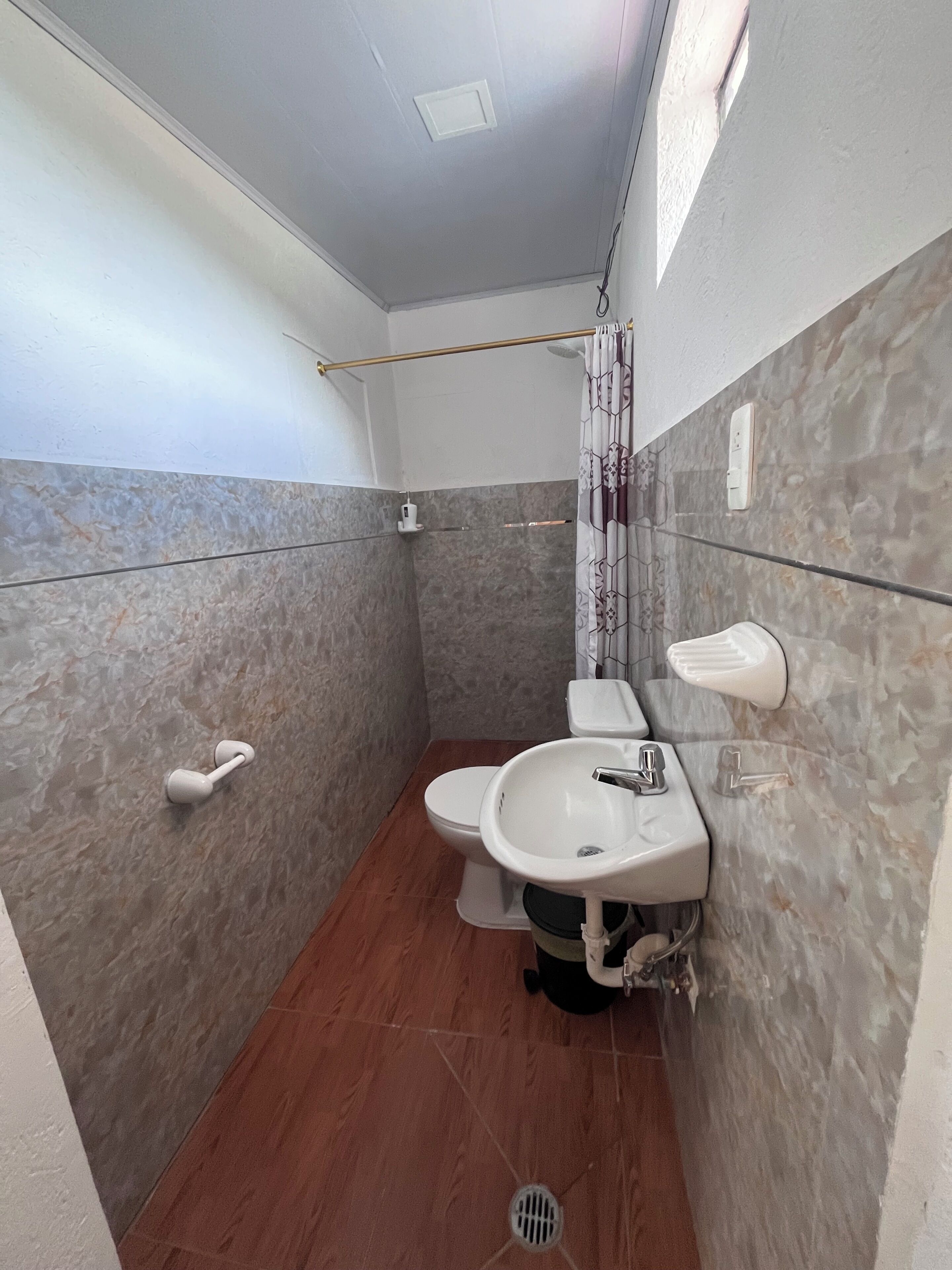 Shower, towels, soap, toilet paper