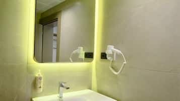 Shower, free toiletries, hair dryer, towels