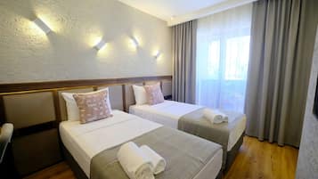 Standard Twin Room, City View | Desk, laptop workspace, free WiFi