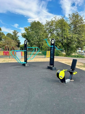 Outdoor exercise equipment in a park. - 2-Bed Retreat- Gated Parking- Work, Recharge, Stay (Worksop)