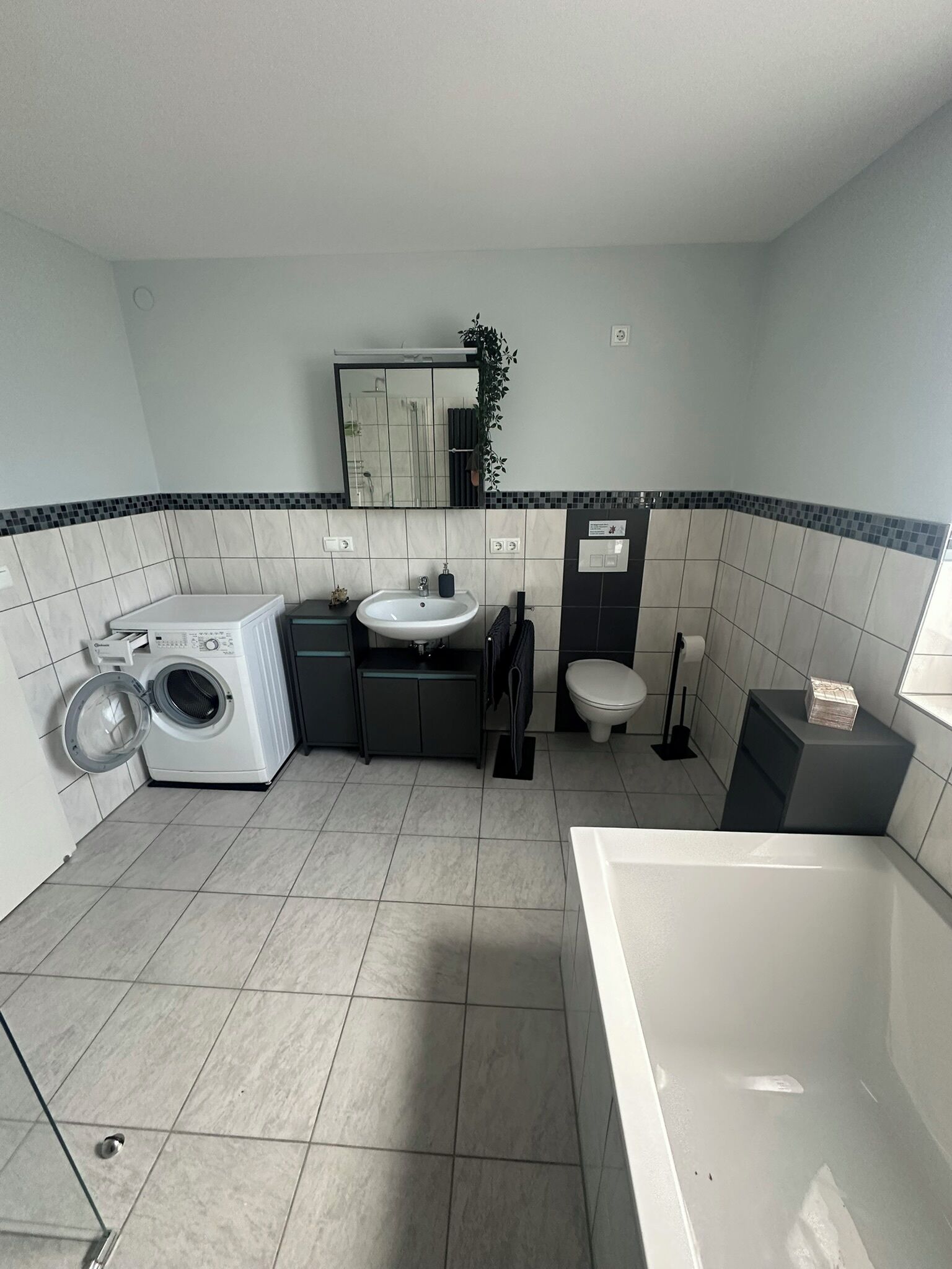 Shower, towels, soap, toilet paper