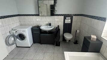 Shower, towels, soap, toilet paper