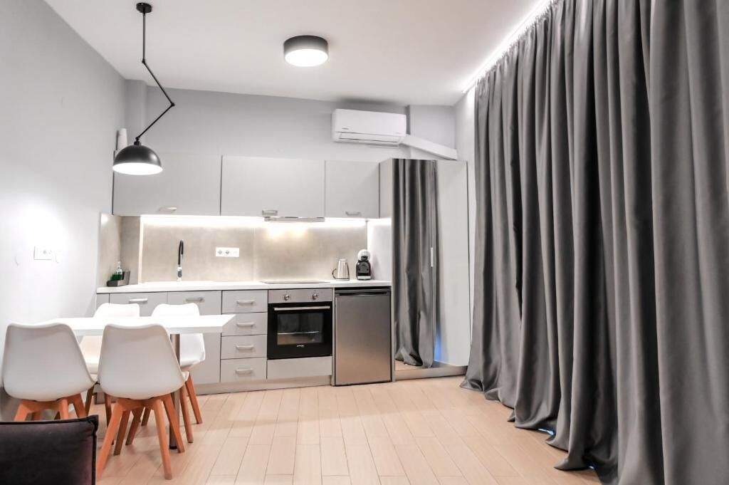 Quarto família, sacada, vista para o pátio | Cozinha privada