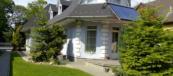 An apartment with a separate entrance is available for rent in a central yet peaceful setting.