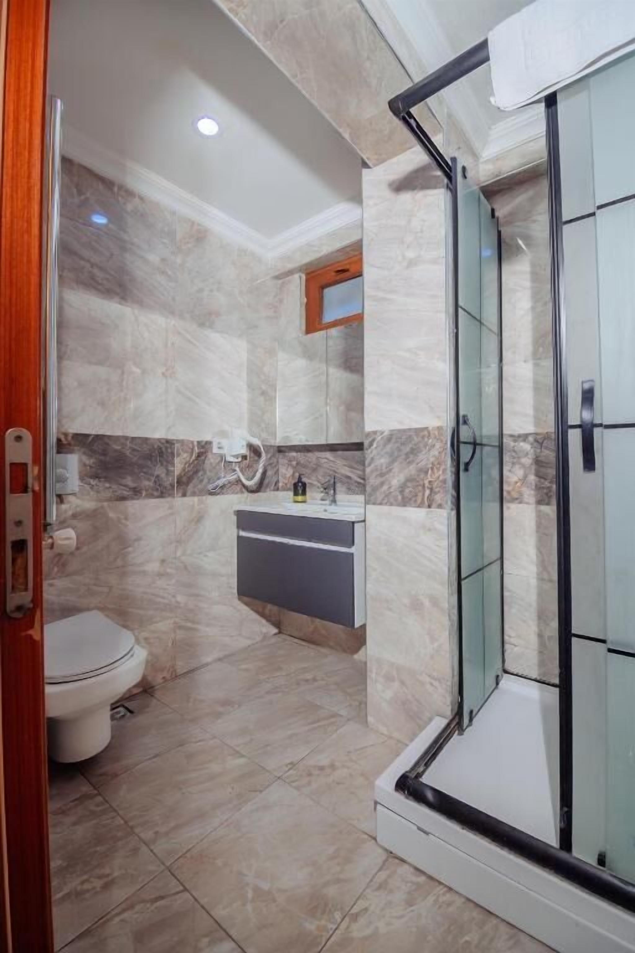 Dúplex, balcón, vistas al jardín | Baño | Zapatillas