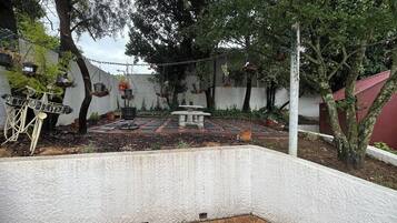 Casa, 1 quarto | Jardim
