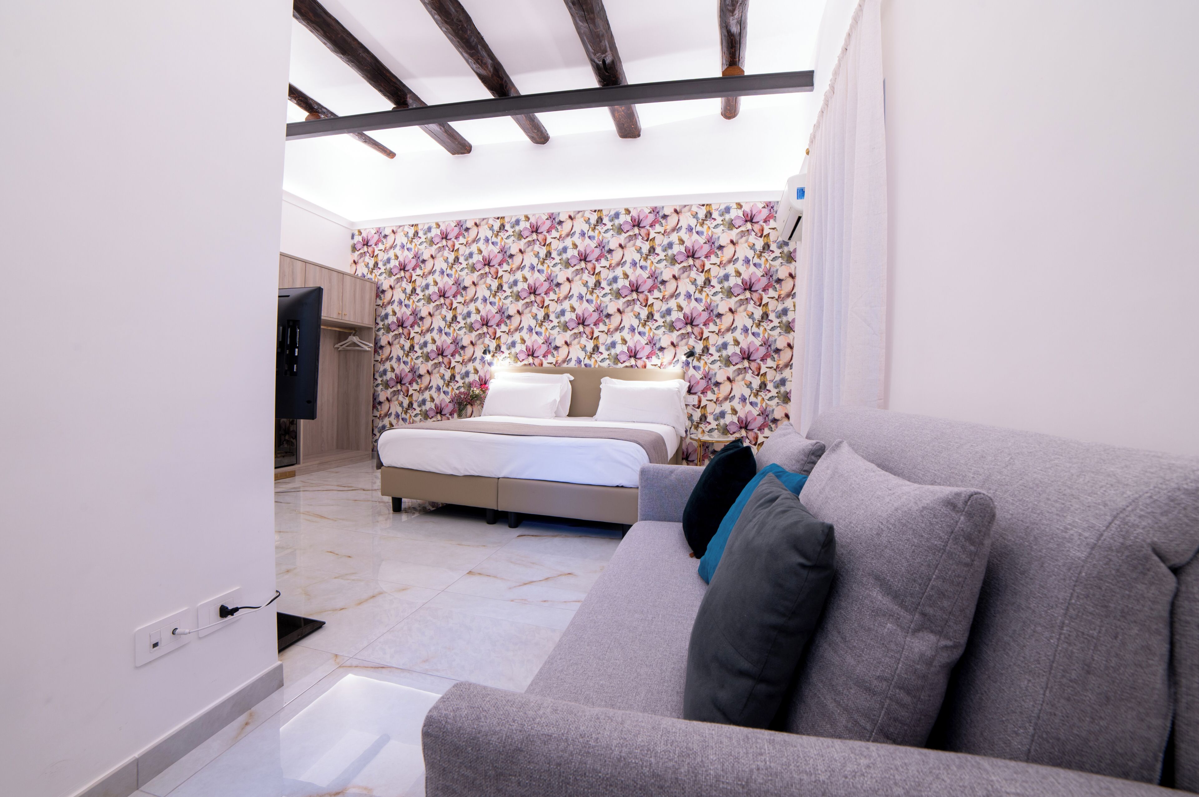 Superior Quadruple Room, City View | In-room safe, blackout curtains, iron/ironing board, free WiFi