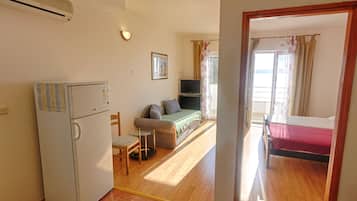 Apartment (Olive two bedroom apartment with balc) | Living room | 32-inch flat-screen TV with cable channels