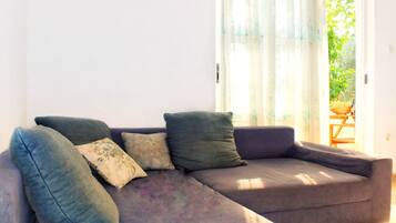 Apartment (Olive one bedroom apartment Olea) | Living room | 32-inch flat-screen TV with cable channels