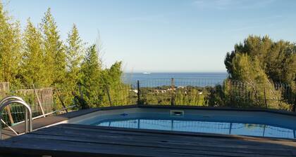Typical, fully-equipped chalet on secure property with Mediterranean sea view.