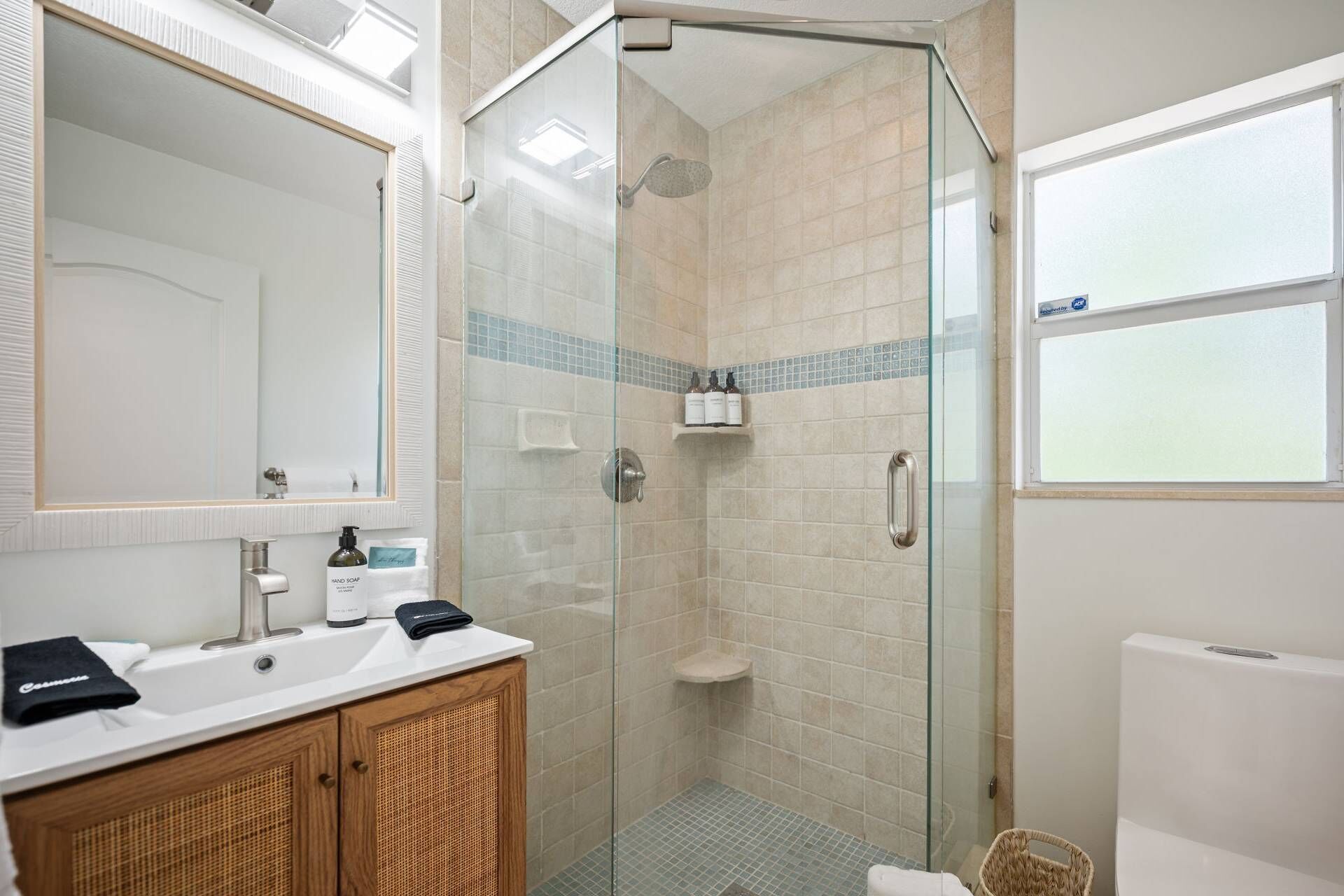 Shower, hair dryer, towels, shampoo
