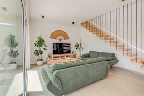 Villa de lujo, vista a la alberca | Área de sala de estar