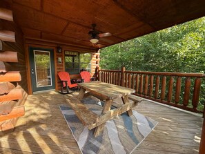 Outdoor dining - 3 bedroom cabin near Dollywood.  Mountain views, hot tub, games, community pool. (Sevierville)