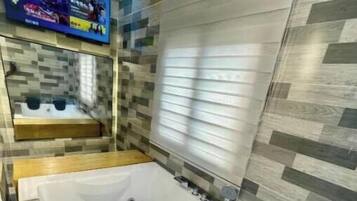 Shower, bidet, towels, soap