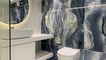 Hair dryer, towels, soap, toilet paper