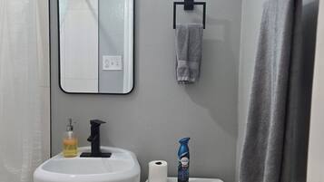 Hair dryer, towels, soap, toilet paper