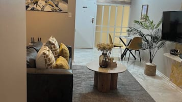 Appartement, 1 chambre | Aire de séjour