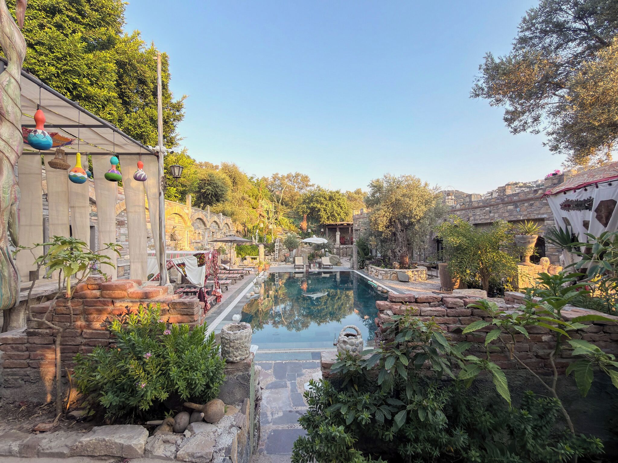 Seasonal outdoor pool, pool umbrellas, pool loungers