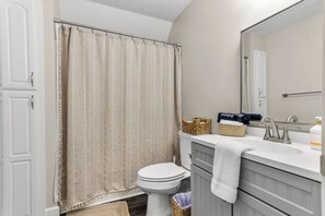 Hair dryer, towels, soap, toilet paper