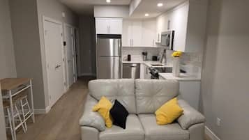 Apartamento, 2 quartos | Área de estar