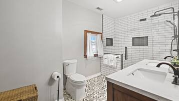 Shower, towels, toilet paper