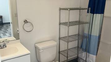 Shower, towels, soap, toilet paper