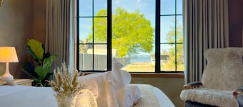Stillwater Resort - Lakefront Estate with two dwellings, spa pools, SUPs - Sleeps 16