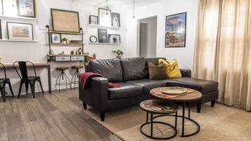 TV, fireplace, books