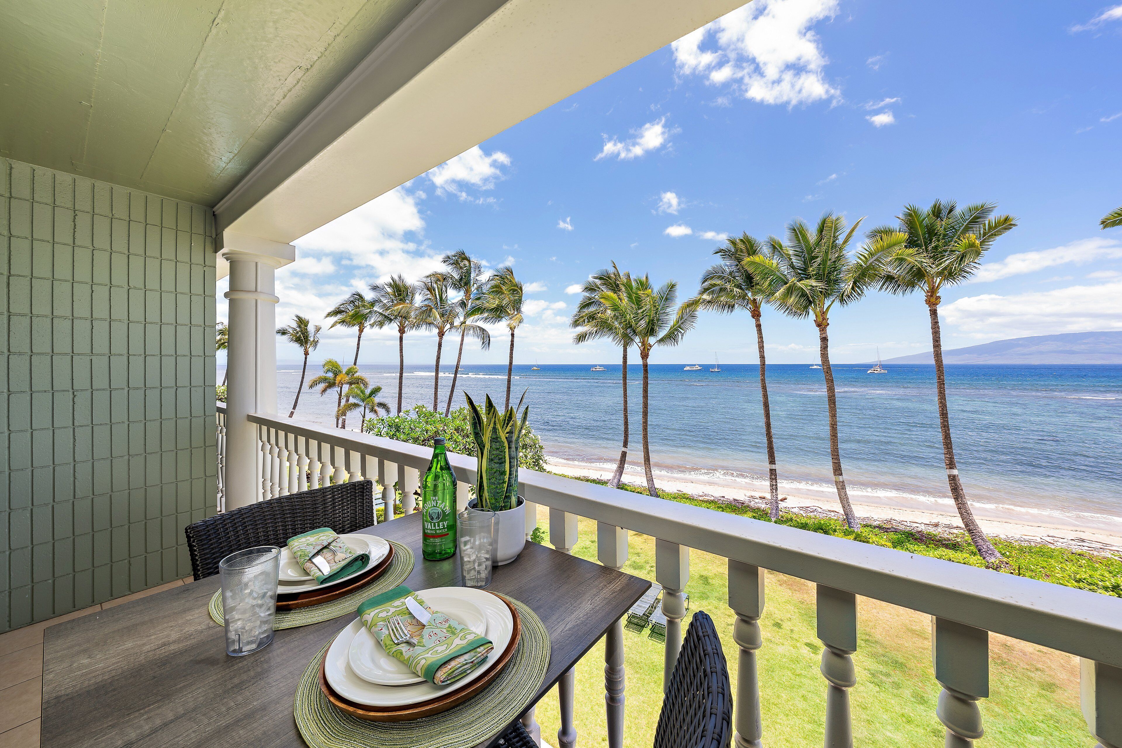 Step out onto your private balcony and take in the spectacular, unobstructed views of the sandy beach, swaying palm trees, and the blue Pacific horizon.