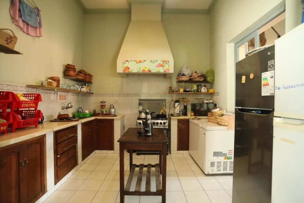 Dormitorio compartido, varias camas | Cocina privada
