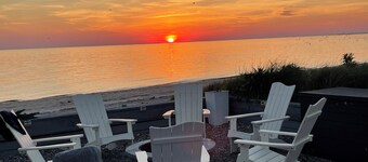 This spectacular home marries BEACHfront and BAYfront!