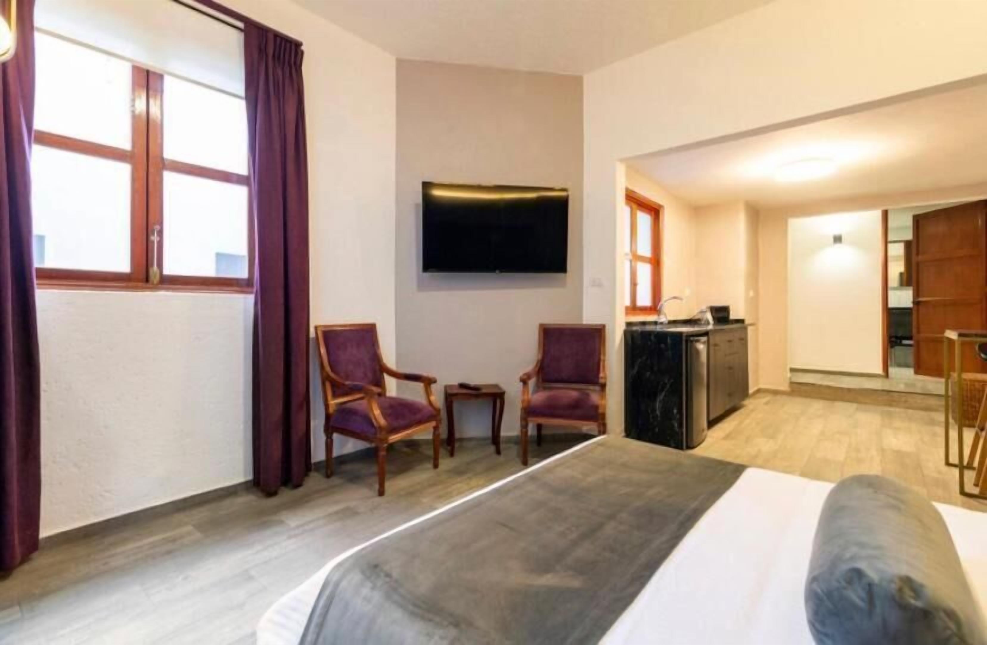 Estúdio conforto, vista para a cidade | Cofres nos quartos, ferros/tábuas de passar roupa, Wi-Fi de cortesia