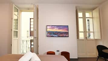 Superior Double Room, Balcony, City View | In-room safe, desk, laptop workspace, soundproofing