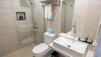 Shower, slippers, towels, soap