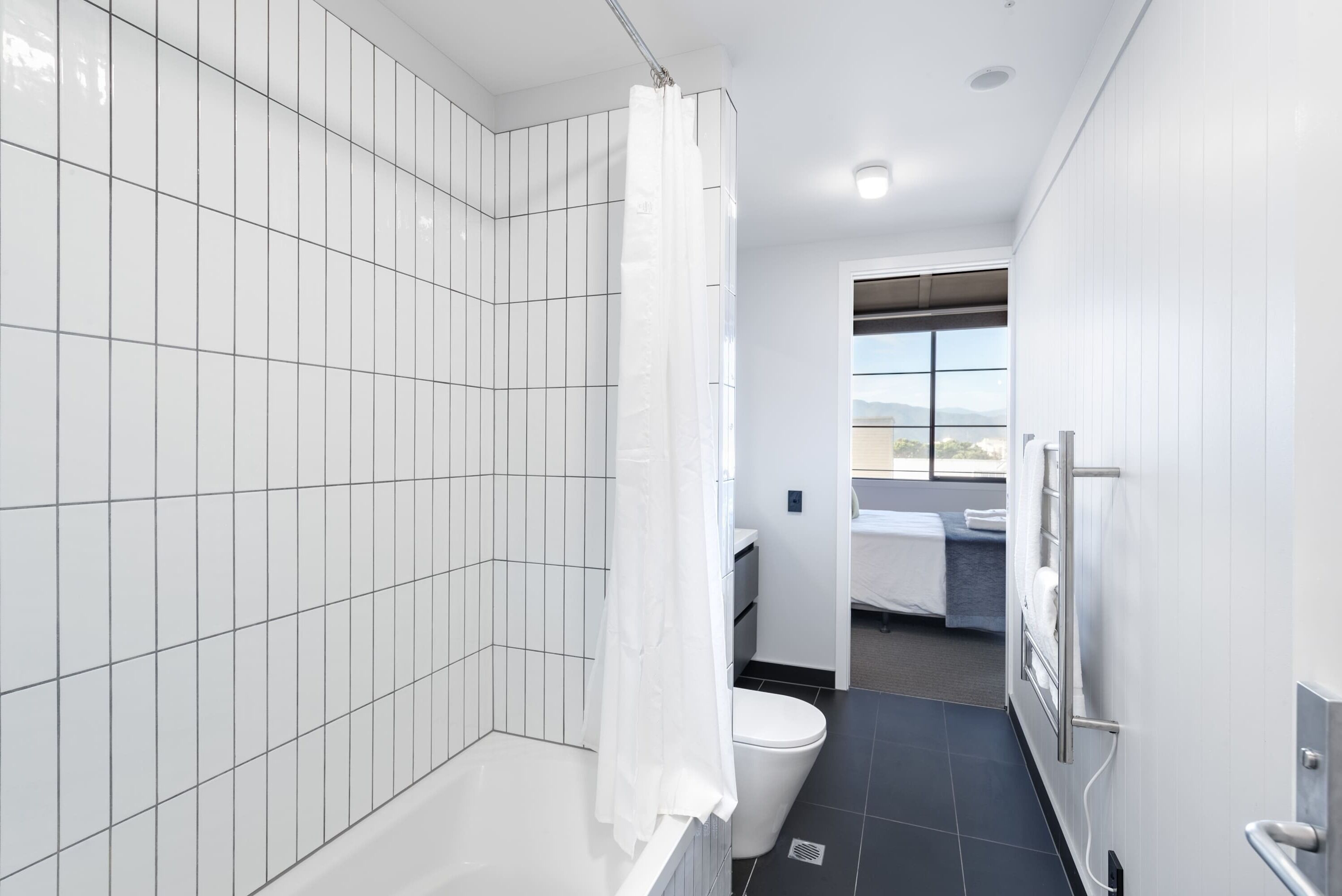 Shower, hair dryer, towels, shampoo