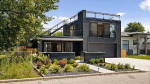 A modern two-story house with a balcony, a garage, and a well-maintained garden. - Enjoy Your Own Private Pool and Backyard Oasis in Windsor (Windsor)
