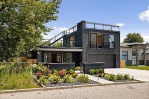 A modern two-story house with a balcony, a garage, and a well-maintained garden. - Enjoy Your Own Private Pool and Backyard Oasis in Windsor (Windsor)