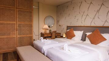 Deluxe Double or Twin Room, City View | In-room safe, desk, laptop workspace, blackout drapes