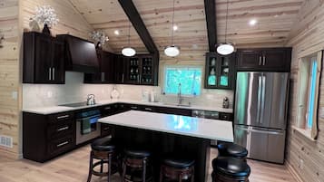 Coffee/tea maker, fridge, microwave, oven